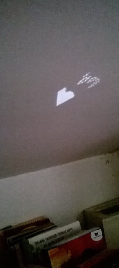 a heart reflected from the light on the floor