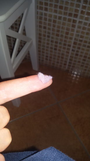 un cuore formato da un batuffolo di polvere