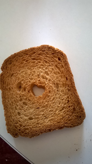 a heart on the toasted bread slice